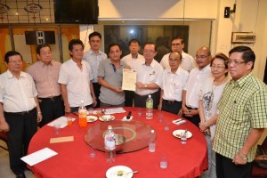 Tan Sri Peter Chin gave letter of appointment to Councilor Acting Chairman Bong Ngim Swee