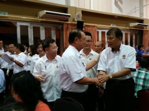 Tan Sri Peter Chin greeting Dato Sebastian Ting on arrival at the dinner