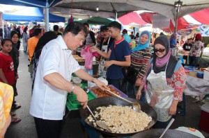 Trying his hand at cooking