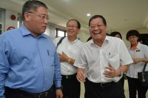 Datuk David Teng and Dato' Sri Tiong King Sing sharing a joke
