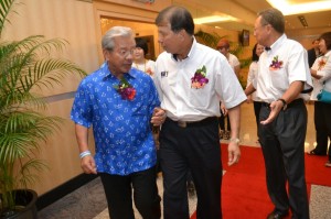 Tan Sri James Masing sharing a word with Dato' Sebastian Ting