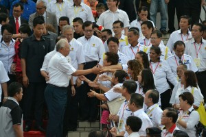 Najib greeting the delegates