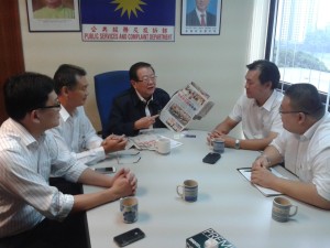 Michael Chong (middle) share a case he handled previously.