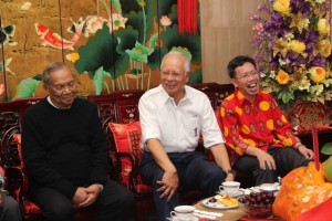 Sharing a light moment , The PM, The CM and Senator Sim at the latter's house