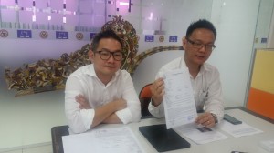 Milton , showing the police report with Michael Tiang