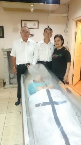 Dato Sebastian and Adam with Theresa paying the last respect to her mother.