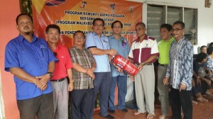 handing over plastic chairs, cooking utensils and fire extinguishers to biro wanita, JKKK Rh Kendawang  on Friday  - Copy