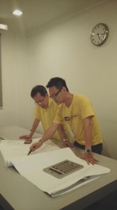 Milton Foo at PR1MA Kuching office looking at the Bintawa project with Datuk Dr Sim Kui Hian