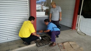 SUPP PCB Chief and candidate for N12 Kota Sentosa Wilfred Yap at the site of the blocked drains