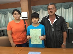 Angelina with her parents