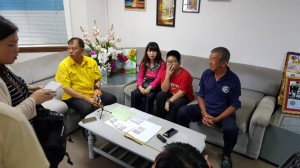 The boy getting his citizenship documentation.