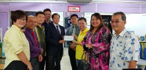 Giving financial grant to respective schools